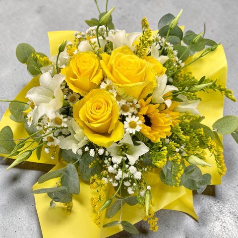 bouquet rose gialle e girasoli